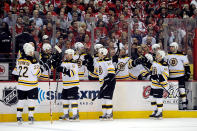 WASHINGTON, DC - APRIL 19: The Boston Bruins celebrate after Rich Peverley #49 scores a goal against the Washington Capitals in Game Four of the Eastern Conference Quarterfinals during the 2012 NHL Stanley Cup Playoffs at Verizon Center on April 19, 2012 in Washington, DC. (Photo by Patrick McDermott/Getty Images)