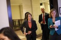 U.S. House Minority Leader Nancy Pelosi (D-CA) (C) arrives for a news conference about pending legislation regarding Department of Homeland Security funding, at the U.S. Capitol in Washington, February 27, 2015. REUTERS/Jonathan Ernst