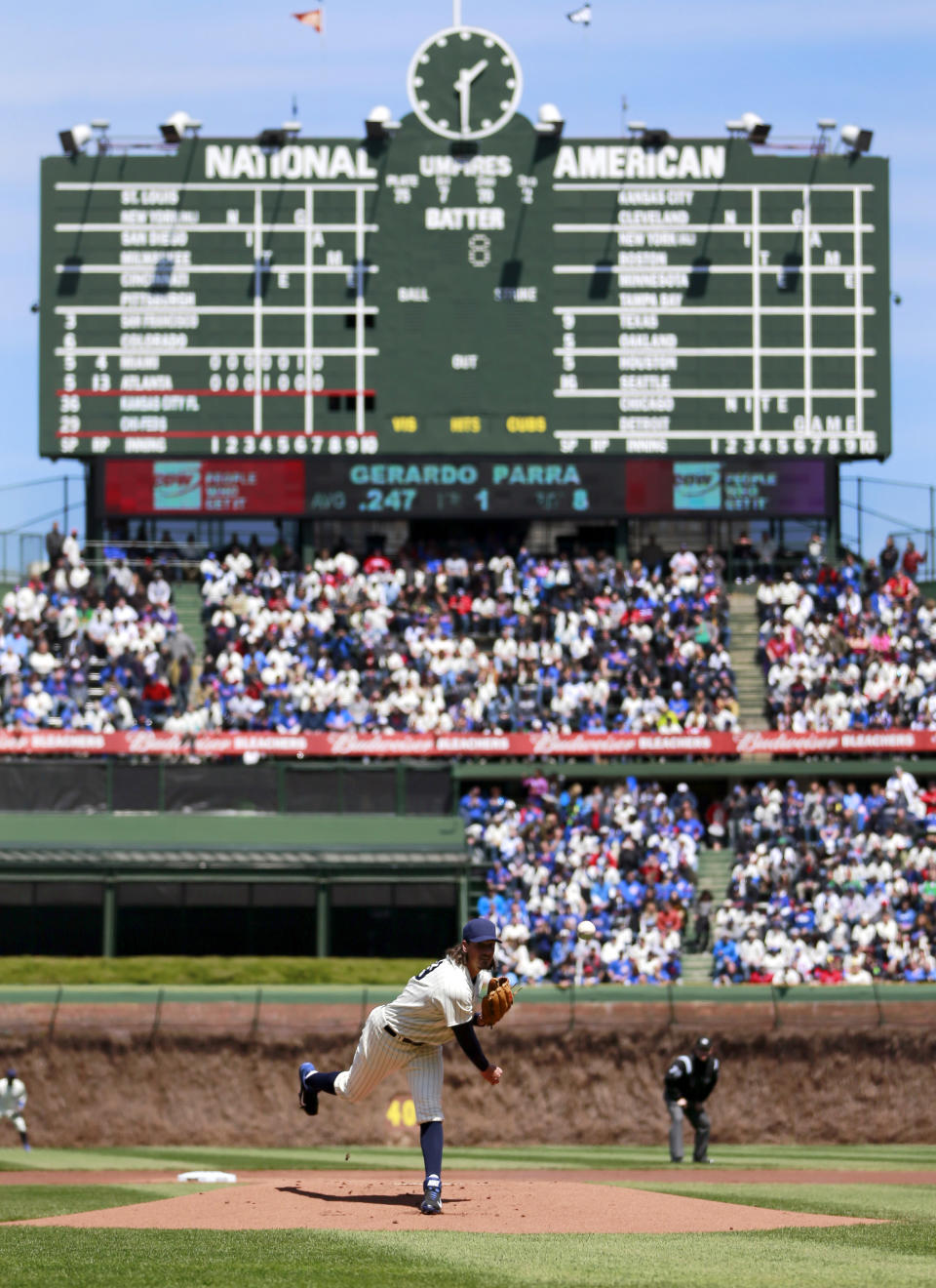 Chicago Cubs starting pitcher Jeff Samardzija delivers a pitch during the first inning at the 100th anniversary of the first baseball game at Wrigley Field against the Arizona Diamondbacks, Wednesday, April 23, 2014, in Chicago. (AP Photo/Charles Rex Arbogast)
