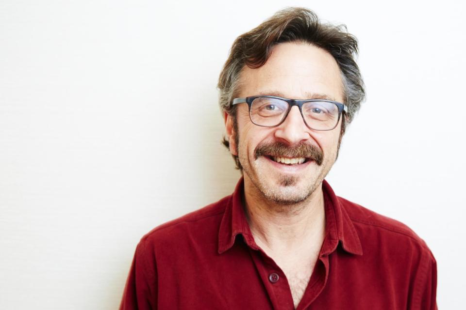 This April 11, 2013 photo shows comedian Marc Maron in New York. Maron stars in the new IFC comedy "Maron," premiering Friday, May 3 at 10 p.m. (Photo by Dan Hallman/Invision/AP)