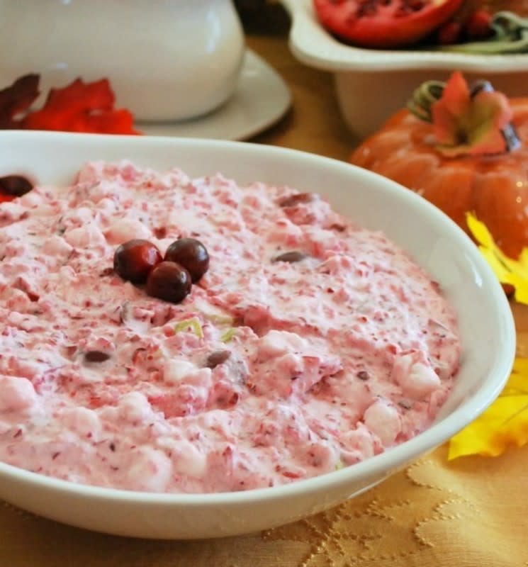 <p>Creations by Kara</p><p>For a sweet addition to your thanksgiving table, this Creamy Cranberry Salad is a perfect blend of sweet and tart, creamy and crunchy. <a href="http://www.creationsbykara.com/2014/11/creamy-cranberry-salad.html/" rel="nofollow noopener" target="_blank" data-ylk="slk:Get the recipe here.;elm:context_link;itc:0;sec:content-canvas" class="link rapid-noclick-resp">Get the recipe here.</a></p>