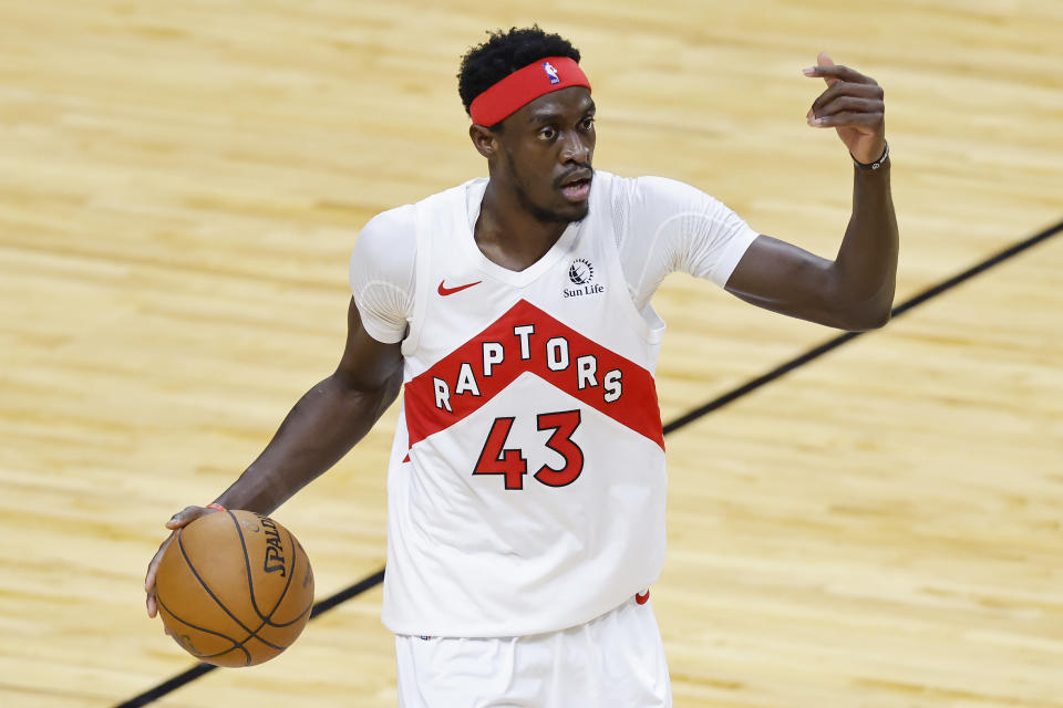 MIAMI, FLORIDA - FEBRUARY 24: Pascal Siakam #43 of the Toronto Raptors dribbles the ball up the court against the Miami Heat during the second quarter at American Airlines Arena on February 24, 2021 in Miami, Florida. NOTE TO USER: User expressly acknowledges and agrees that, by downloading and or using this photograph, User is consenting to the terms and conditions of the Getty Images License Agreement.  (Photo by Michael Reaves/Getty Images)