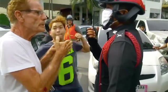 The Thai man throws a punch hitting Gerard Collins. Source: Newsflare