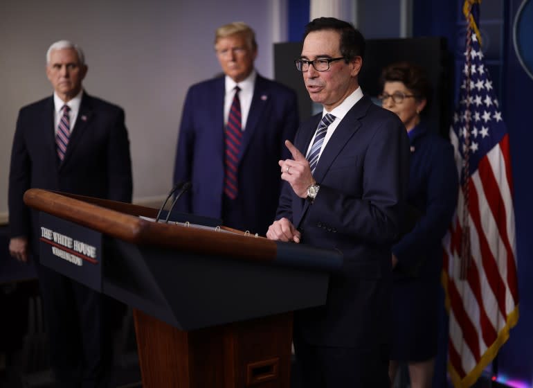 WASHINGTON, DC - APRIL 02: Treasury Secretary Steven Mnuchin speaks in the press briefing room with President Donald Trump, Vice President Mike Pence and Small Business Administrator Jovita Carranza during the Coronavirus Task Force briefing April 2, 2020 in Washington, DC. The U.S. government reported an unprecedented 6.6 million jobless claims this morning as a result of the coronavirus outbreak. (Photo by Win McNamee/Getty Images)