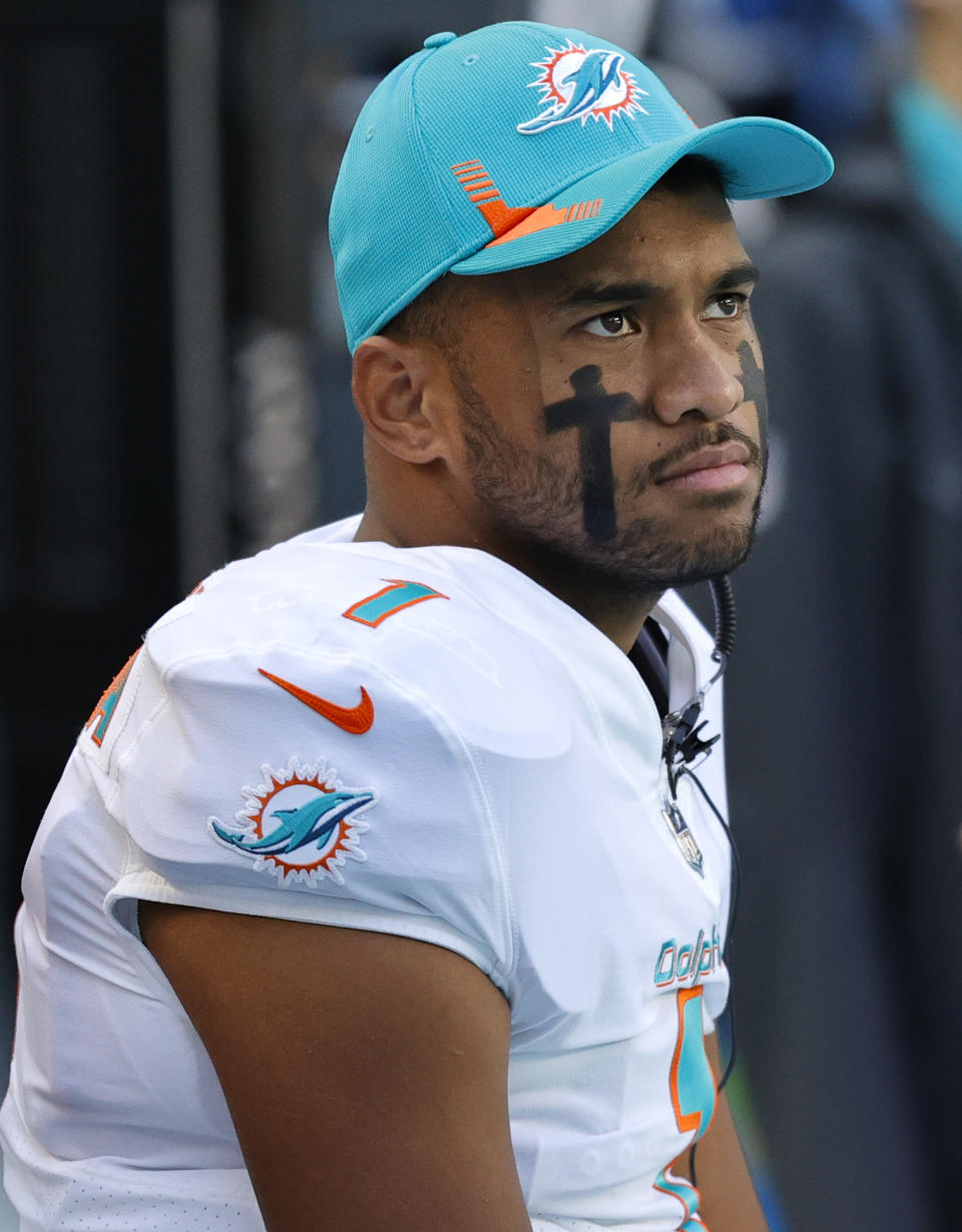 Miami Dolphins quarterback Tua Tagovailoa (1) looks on before the start of an NFL football game against the Houston Texans at Hard Rock Stadium on Sunday, November 7, 2021 in Miami Gardens, Fla. (David Santiago/Miami Herald via AP)