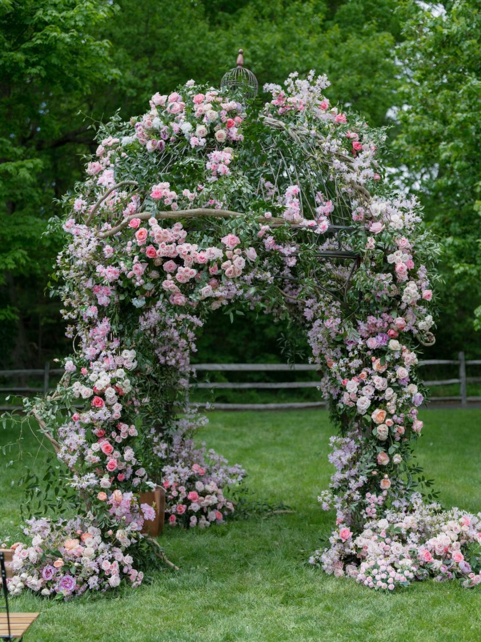 a floral arch at a wedding