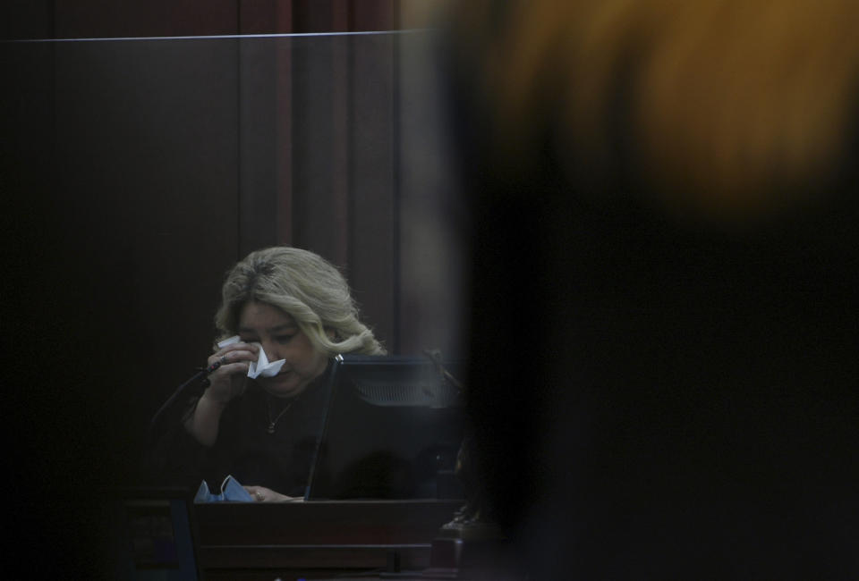 Patricia Perez begins to weep while giving a victim impact statement at Justice A.A. Birch Building in Nashville, Tenn., on Saturday, Feb. 5, 2022. Jurors are hearing testimony about whether or not to make parole possible after 51 years in prison for Travis Reinking, the man who shot and killed four people at a Nashville Waffle House in 2018. Jurors on Friday rejected Reinking’s insanity defense as they found him guilty on 16 charges, including four counts of first-degree murder. (Nicole Hester/The Tennessean via AP, Pool)