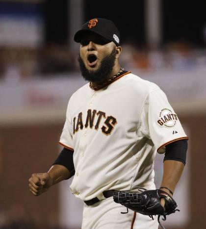 Yusmeiro Petit reacts after the sixth inning of Game 4 of the World Series. (AP Photo)