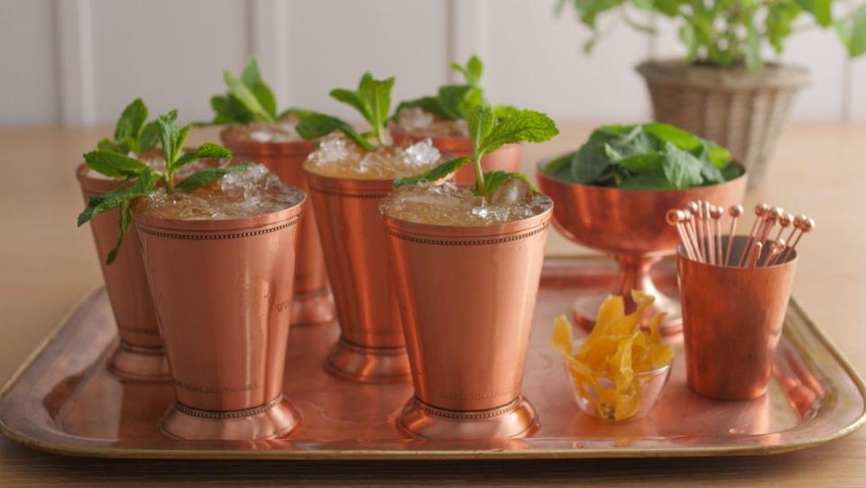 Big-Batch Lemon-Mint Julep is on the 'Kentucky Derby At-Home' menu created in partnership by Martha Stewart and Churchill Downs Racetrack.