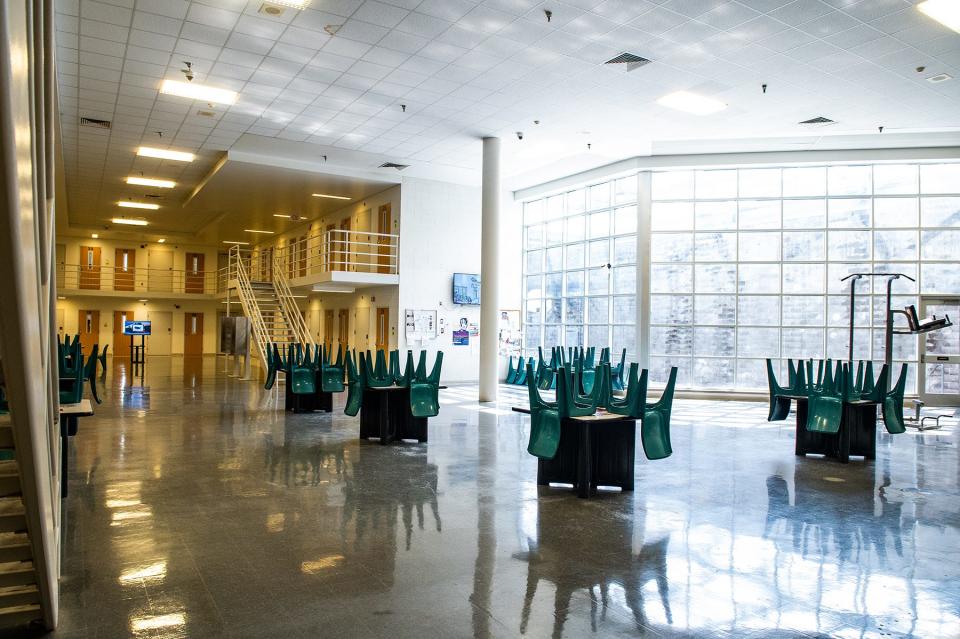 Inmates stay in their cells for lunch in the housing unit A3 ICE pod at the Orange County Jail in Goshen on March 11.