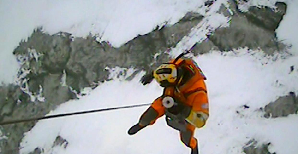 In this image taken from video, U.S. Coast Guard Air Station Detroit and Station Marblehead help ice fishermen stranded on an ice floe near Catawba Island on Lake Erie, Ohio, Monday, Jan. 22, 2024. Twenty people were rescued from the ice floe. (U.S. Coast Guard via AP)