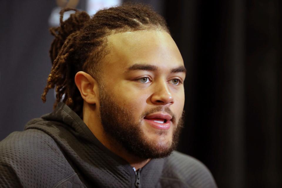 Michigan linebacker Mike Morris talks with reporters about the Fiesta Bowl against TCU on Wednesday, Dec. 28, 2022, in Scottsdale, Arizona.