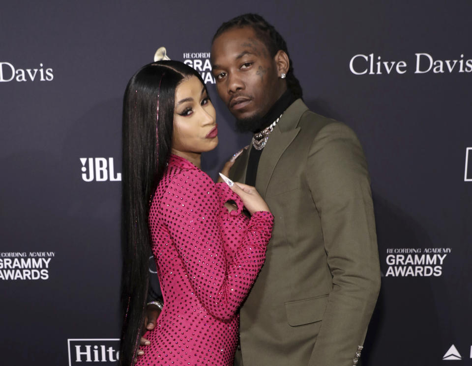 FILE - Cardi B, left, and Offset arrive at the Pre-Grammy Gala And Salute To Industry Icons in Beverly Hills, Calif. on Jan. 25, 2020. Cardi B has filed for divorce from Offset, claiming her marriage was “irretrievably broken.” A Fulton County Courthouse filing states that she filed the divorce documents Tuesday in Atlanta. (Photo by Mark Von Holden/Invision/AP, File)