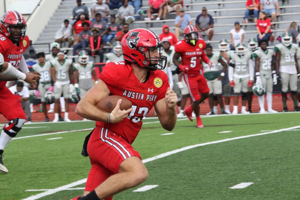 Austin Peay quarterback Mike DiLiello looks for more yards as he scrambles out of the pocket against Mississippi State in the second quarter during their college football game Saturday, Sept. 10, 2022 at Fortera Stadium in Clarksville, Tennessee.