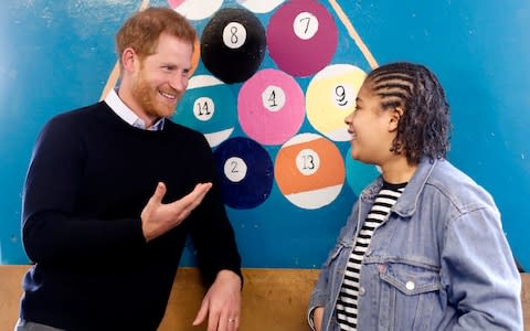 Prince Harry, Duke of Sussex speaks to Tiana Baptiste during his visit to a Fit and Fed half-term initiative in Streatham - Credit: Chris Jackson