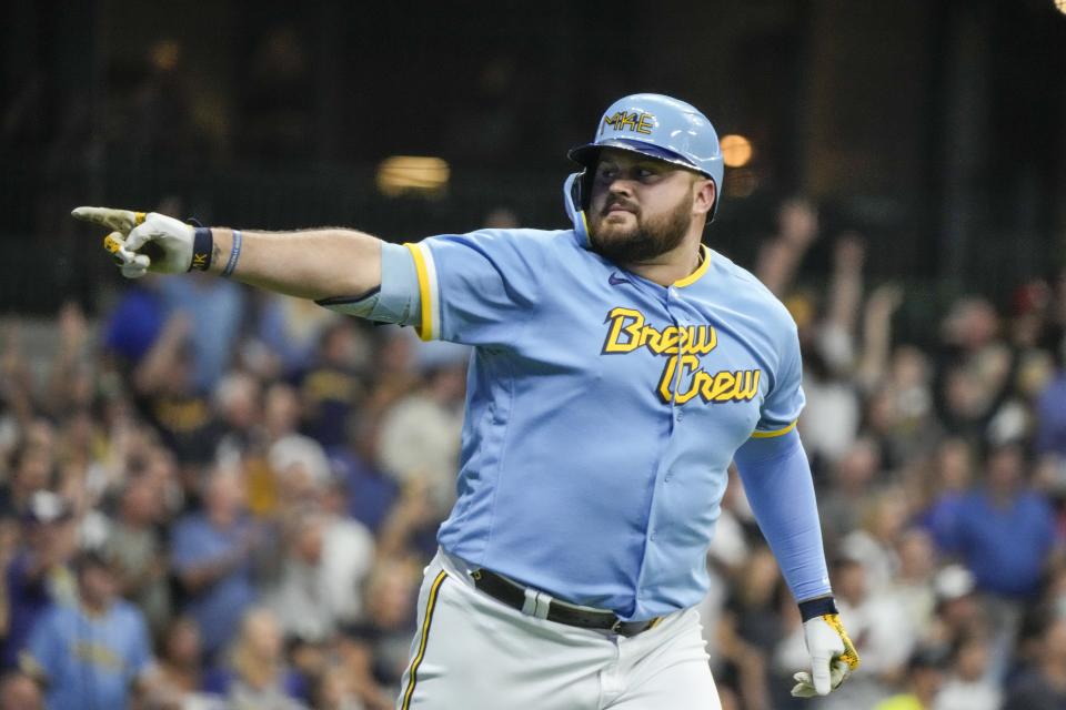 Milwaukee Brewers' Rowdy Tellez reacts after hitting a three-run home run during the third inning of a baseball game against the San Diego Padres Friday, Aug. 25, 2023, in Milwaukee. (AP Photo/Morry Gash)