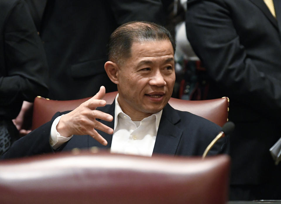 Sen. John Liu, D-Queens, talks to Senate members at the Capitol in Albany, N.Y., in 2019. (Hans Pennink / AP file)