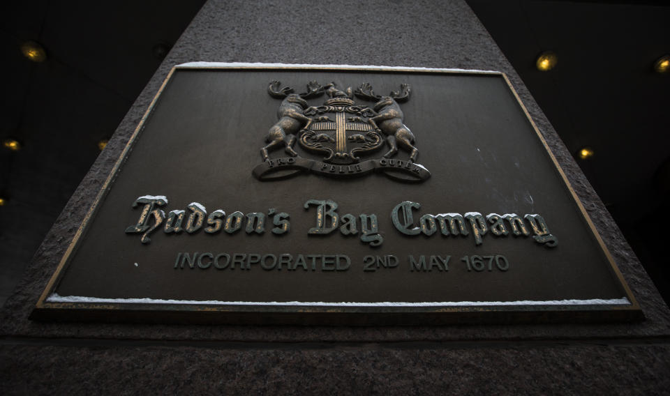 A sign is seen at the Hudson's Bay Company (HBC) flagship department store in Toronto January 27, 2014.  Hudson's Bay Co said on Monday that it would sell its flagship downtown Toronto store and neighboring executive offices for C$650 million ($587.09 million) to Cadillac Fairview Corp and open a full-line Saks store in the leased-back space. The Canadian retailer, which completed its $2.4 billion purchase of U.S. luxury chain Saks Inc late last year, said it expects to open an approximately 150,000 square-foot, multi-level Saks in the fall of 2015, co-located with the current Hudson's Bay store.  REUTERS/Mark Blinch (CANADA - Tags: BUSINESS)