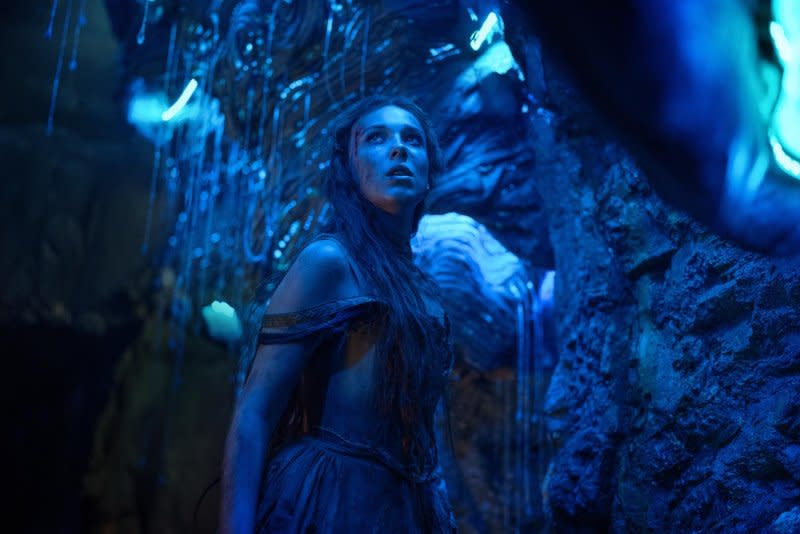 Elodie (Millie Bobby Brown) explores a dragon's cave in "Damsel." Photo courtesy of Netflix