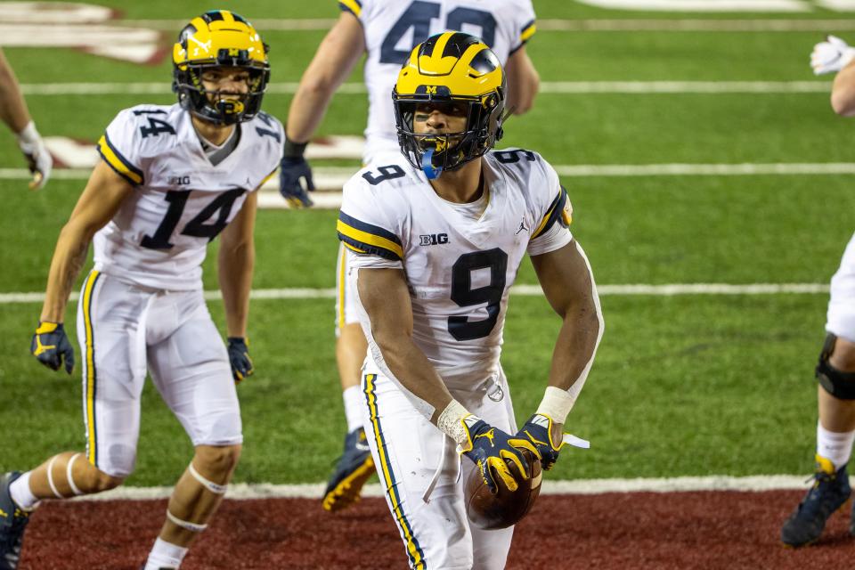 Michigan running back Chris Evans celebrates after scoring a touchdown in the second half against Minnesota at TCF Bank Stadium, Oct. 24, 2020.