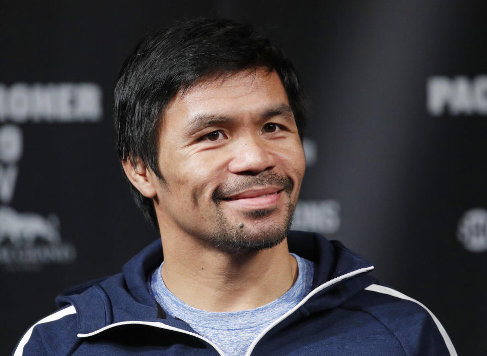 FILE - In this Jan. 16, 2019, file photo, Manny Pacquiao attends a news conference in Las Vegas. The Associated Press asked eight of the greatest current and former champions, including Pacquiao, from seven different sports to find out what impressed them most about Tom Brady. (AP Photo/John Locher, File)