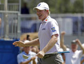 Brandt Snedeker smiles after making a birdie putt on the ninth hole during the first round of the Wyndham Championship golf tournament in Greensboro, N.C., Thursday, Aug. 16, 2018. Sneaker shot a 59 in the first round. (AP Photo/Chuck Burton)