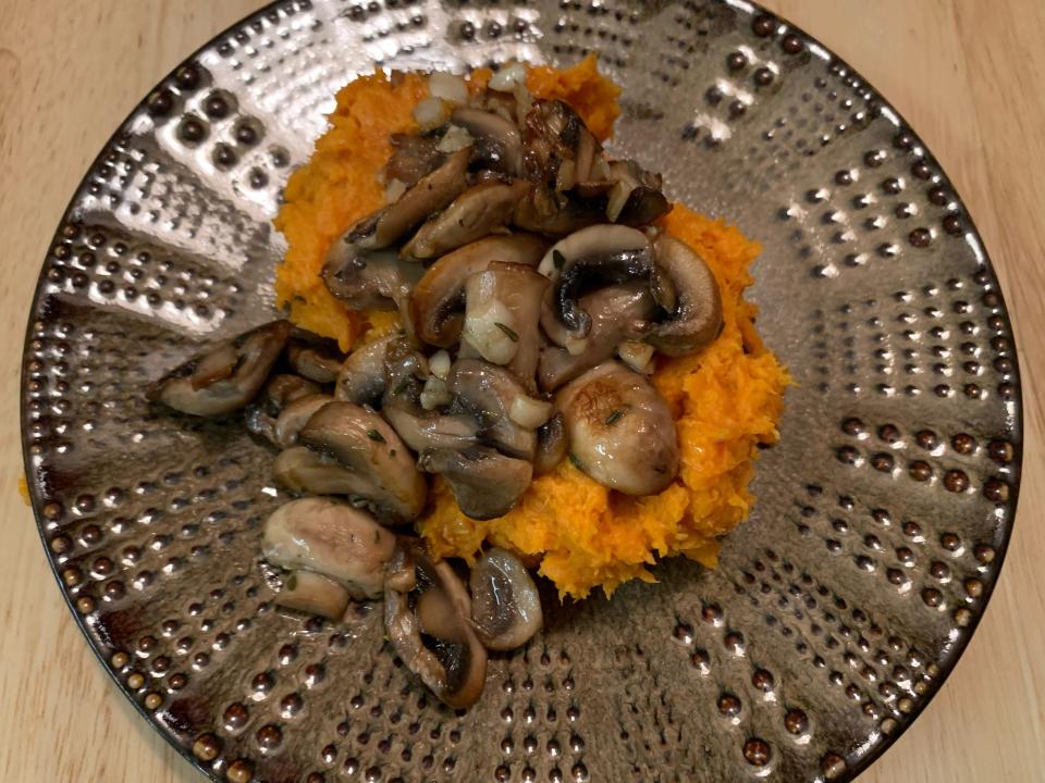 mashed sweet potatoes topped with mushrooms