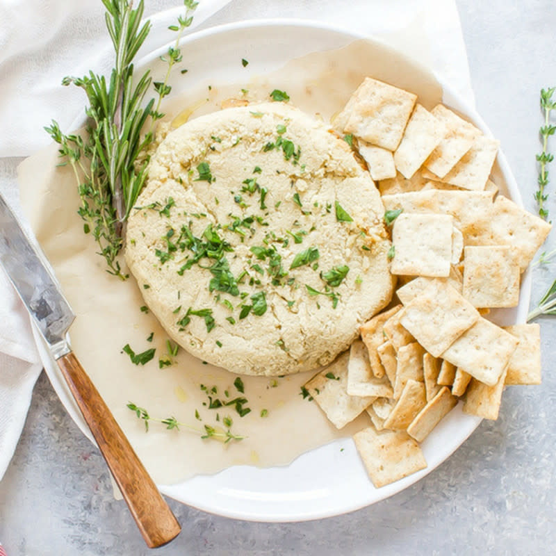 <p>Whole New Mom</p><p>This Baked Almond Feta makes a great dairy-free cheese spread for all of your festivities!</p><p><strong>Get the recipe: <a href="https://wholenewmom.com/recipes/almond-feta/" rel="nofollow noopener" target="_blank" data-ylk="slk:Almond Feta Cheese;elm:context_link;itc:0;sec:content-canvas" class="link rapid-noclick-resp">Almond Feta Cheese</a></strong></p>