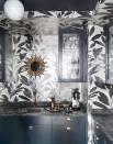 <p>Metallic wallpaper is the perfect backdrop for a moody, intimate home bar or wine cellar. <a href="https://www.studiodb.com/" rel="nofollow noopener" target="_blank" data-ylk="slk:Studio DB;elm:context_link;itc:0;sec:content-canvas" class="link ">Studio DB</a> paired it with black marble surfaces and stained wood cabinets to finish the look. And, of course, don't forget to keep glasses in the area for tastings. </p>