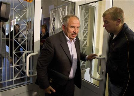 Dmitry Goryachko, the lawyer of CEO of the world's top potash producer Uralkali Vladislav Baumgertner, leaves a court room in Minsk, September 6, 2013. A district court in Minsk decided to leave Baumgertner in detention on Friday, resisting pressure from Russia to release him after his arrest last month after the break-up of a local joint venture. REUTERS/Vasily Fedosenko