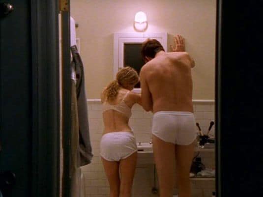 Carrie and Adrian cleaning their teeth in matching briefsSexandthecity/HBO