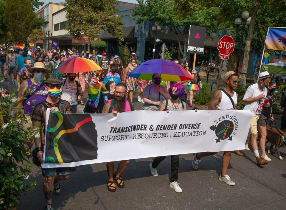 Hundreds of marchers make their way down West Broadway on Saturday, Aug. 14 on their way to Alton Baker Park for the 2021 Eugene Pride in the Park.