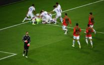 Soccer Football - Portugal v Chile - FIFA Confederations Cup Russia 2017 - Semi Final - Kazan Arena, Kazan, Russia - June 28, 2017 Chile’s Claudio Bravo celebrates with team mates after saving from Portugal’s Nani during the penalty shoot out as Portugal’s Rui Patricio looks dejected REUTERS/Kai Pfaffenbach