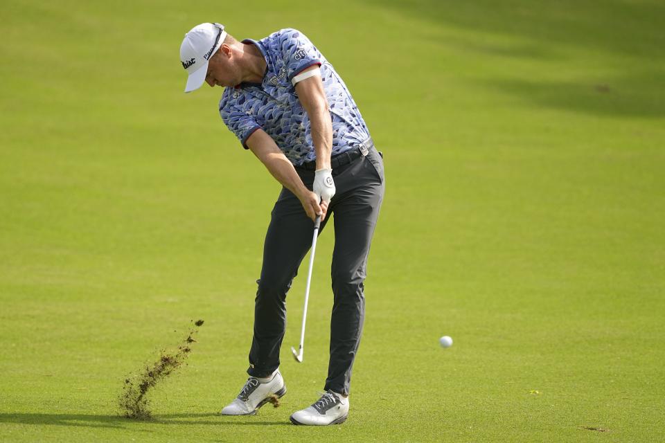 Justin Thomas hits from the fairway on the 18th hole during Friday's second round of the PGA Championship at Southern Hills Country Club in Tulsa, Oklahoma.