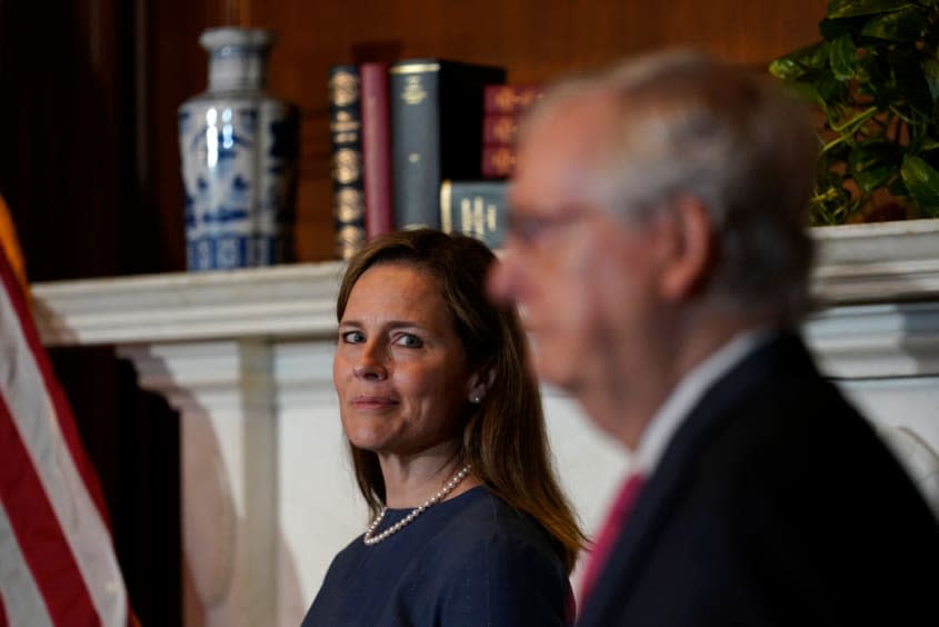 Amy Coney Barrett and Mitch McConnell