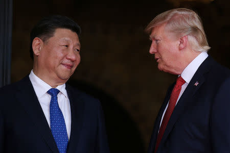 President Trump welcomes Chinese President Xi Jinping at Mar-a-Lago state in Palm Beach, Florida. REUTERS/Carlos Barria