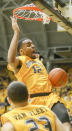 Wichita State's Darius Carter dunks the ball against Drake in the second half at Koch Arena Saturday Feb. 22, 2014. in Wichita, Kan. (AP Photo/The Wichita Eagle, Fernando Salazar) LOCAL TV OUT; MAGS OUT; LOCAL RADIO OUT; LOCAL INTERNET OUT