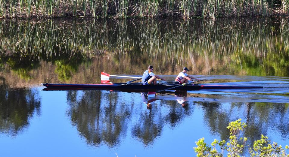 On an early March 2023 morning, the Florida Tech men’s varsity rowing team trains with the women’s rowing club in the C-54 canal in Fellsmere.