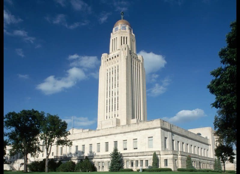 <strong>NEBRASKA STATE CAPITOL</strong>  Lincoln, Nebraska    <strong>Year completed:</strong> 1932  <strong>Architectural style:</strong> Streamline Moderne  <strong>FYI:</strong> Don’t forget to look down. Hildreth Meire’s mosaics decorate both the ceiling and the floor of the building. Although Meire worked on the National Academy of Science in Washington D.C. and St. Bartholomew’s Church in New York City, she called the Nebraska capitol her crowning achievement.  <strong>Visit:</strong> Guided tours are available  every hour on the hour (except noon): Monday through Friday, from 8 a.m. to 5 p.m.; Saturday and holidays, from 10 a.m. to 5 p.m.; and Sunday, from 1 p.m. to 5 p.m.