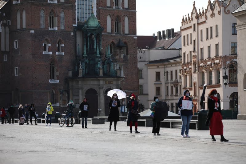 Activists protest against an initiative to tighten abortion rules in Krakow