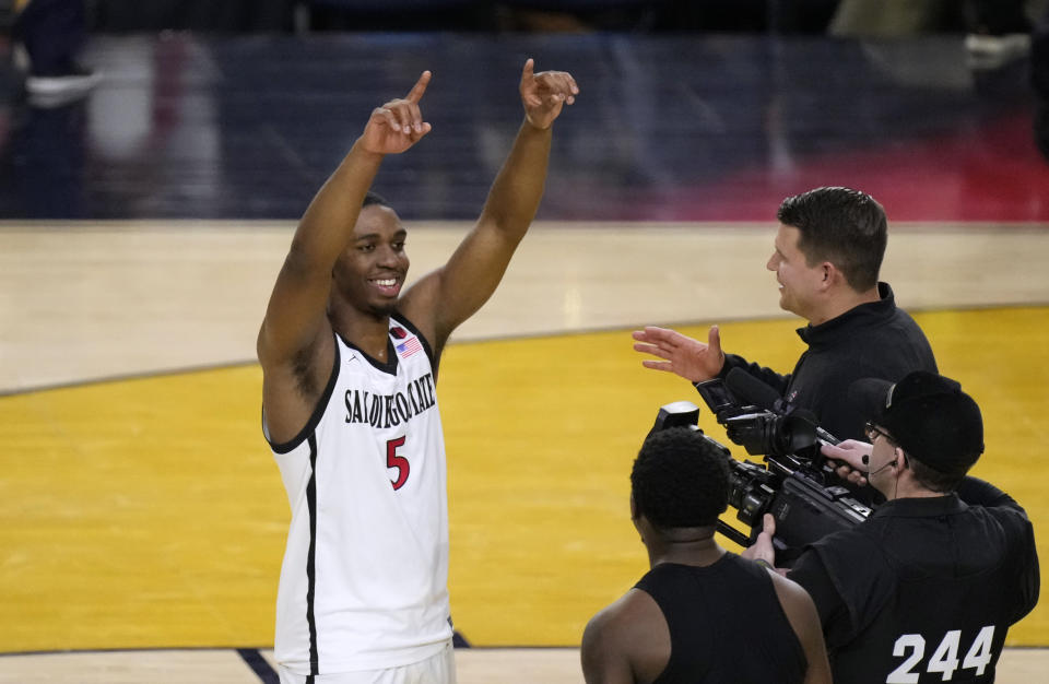 San Diego State guard Lamont Butler celebrates after defeating Florida Atlantic in a Final Four college basketball game in the NCAA Tournament on Saturday, April 1, 2023, in Houston. (AP Photo/Godofredo A. Vasquez)