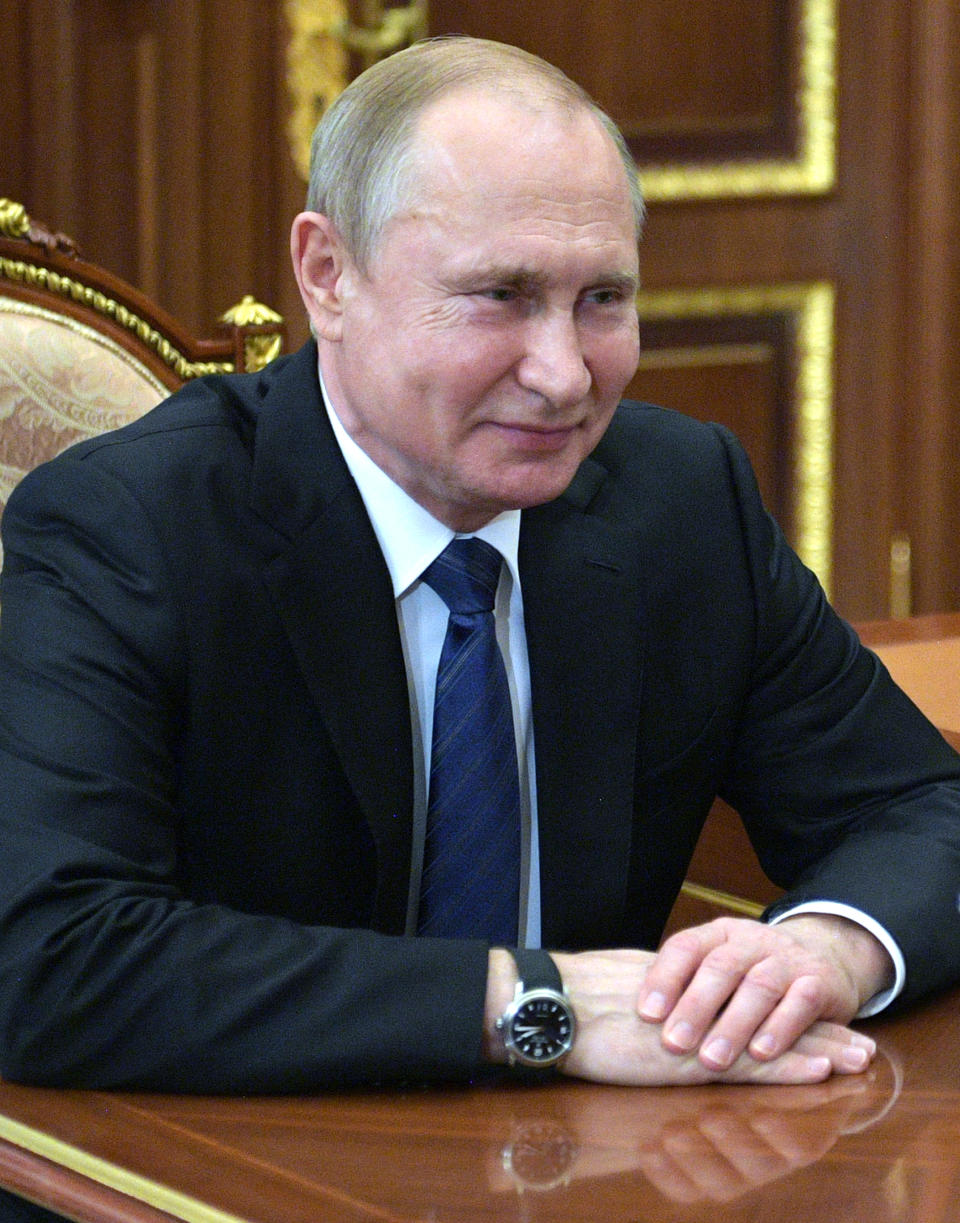 Russian President Vladimir Putin listens during a meeting in the Kremlin, in Moscow, Russia, Monday, July 15, 2019. (Alexei Druzhinin, Sputnik, Kremlin Pool Photo via AP)