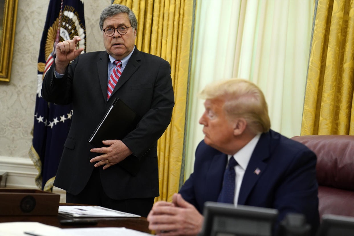 Donald Trump and Bill Barr in the Oval Office in May 2020. (Evan Vucci/AP)