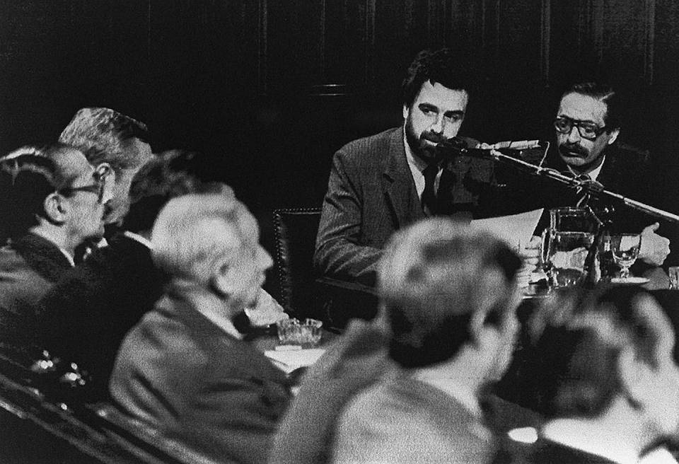 Luis Moreno Ocampo and Julio Cesar Strassera, right, presenting allegations against the accused ex-military leaders in 1985. <a href="https://www.gettyimages.com/detail/news-photo/this-file-picture-taken-in-buenos-aires-13-september-1985-news-photo/52009542?phrase=argentina%201985&adppopup=true" rel="nofollow noopener" target="_blank" data-ylk="slk:AFP/AFP via Getty Images;elm:context_link;itc:0;sec:content-canvas" class="link ">AFP/AFP via Getty Images</a>