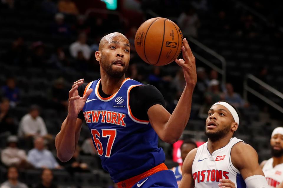 New York Knicks forward Taj Gibson grabs a rebound during the second half of an NBA basketball game against the Detroit Pistons, Wednesday, Nov. 6, 2019, in Detroit. (AP Photo/Carlos Osorio)