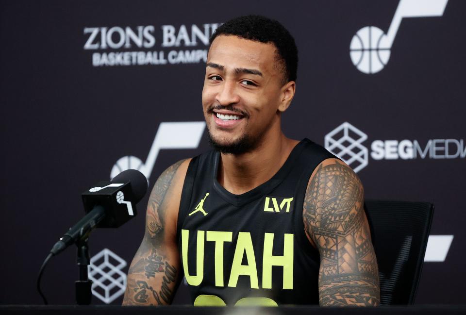 Forward John Collins talks to members of the media during Utah Jazz media day at the Zions Bank Basketball Campus.