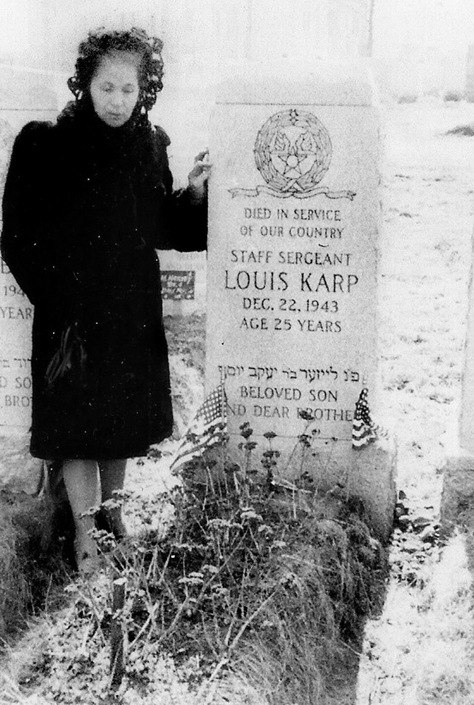 In an undated photograph believe to be from the 1940s, Louis Karp's mother Jennie makes one of her nearly weekly visits to his grave in New York. When Louis died, she had two other sons in the war. When another was shot down and believed killed, she asked the president to bring the other home.