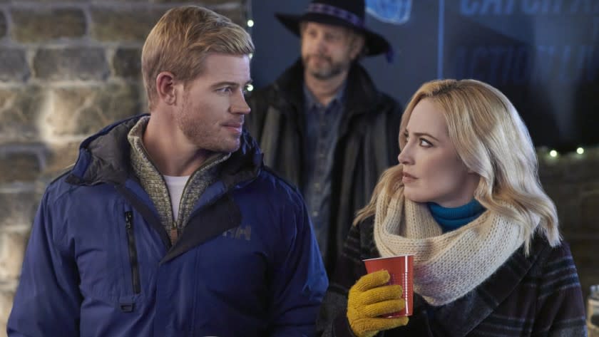 Two for the Win -- Hallmark TV Movie A world champion ski racer and local ski instructor find romance on the slopes as he returns home and prepares for the biggest race of his life. Photo: Trevor Donovan, Charlotte Sullivan Credit: ©2021 Crown Media United States LLC/Photographer: Albert Camicioli Trevor Donovan and Charlotte Sullivan in "Two for the Win" on Hallmark.