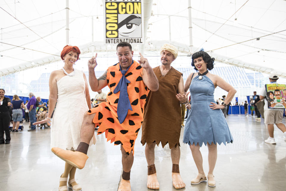 The Flintstones cosplayers.