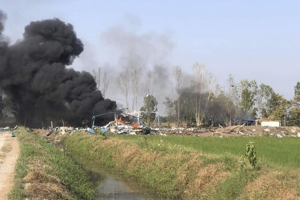 A smoke rises after an explosion at a firework factory in Suphan Buri province, Thailand, Wednesday, Jan. 17, 2024. The Thai government’s disaster relief agency says an explosion at a fireworks factory in central Thailand has killed at least 20 people. (Samekan Suphan Buri Foundation via AP)